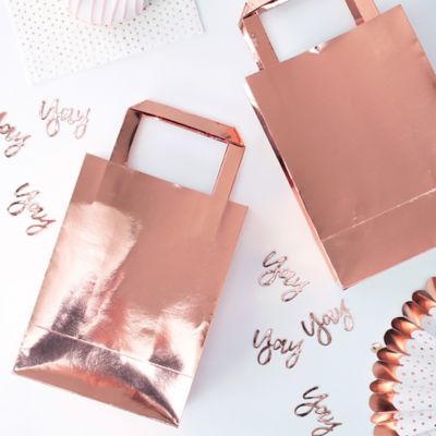 pink and gold gift bags